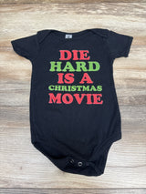 Gildan 'Die Hard is a Christmas Movie' Bodysuit Black sz 12-18m