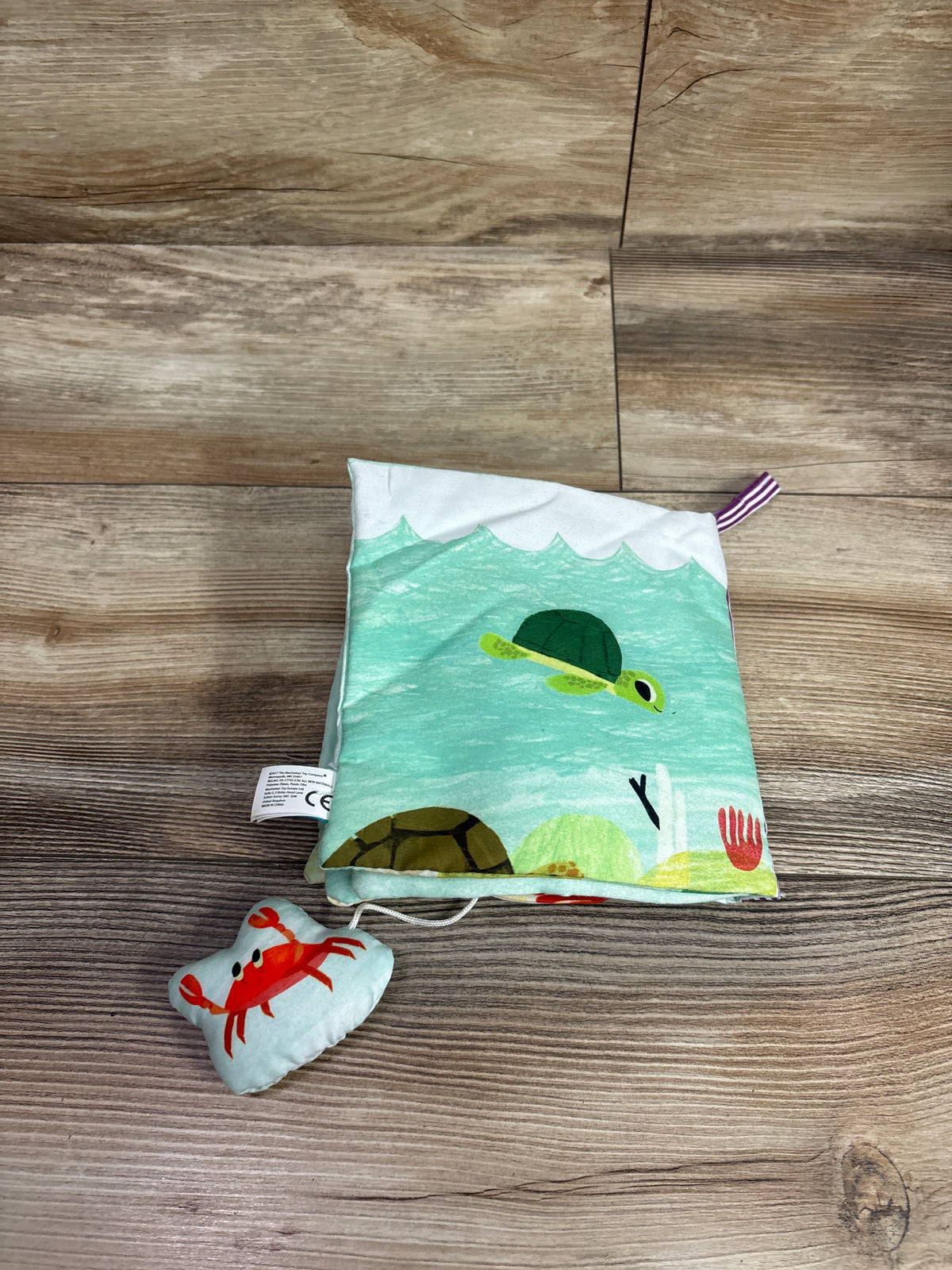 Manhattan Toys Baby Turtle In The Ocean Soft Activity Book