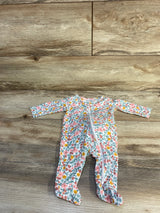 Front flat lay of white floral footed baby sleeper size 3 months showing diagonal zip closure and long sleeves on wood floor