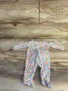 Front flat lay of white floral footed baby sleeper size 3 months showing diagonal zip closure and long sleeves on wood floor