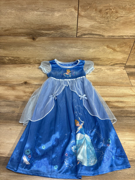 Flat lay blue Disney Cinderella nightgown size 3T with sheer puff sleeves, tulle overlay and princess print on wood background