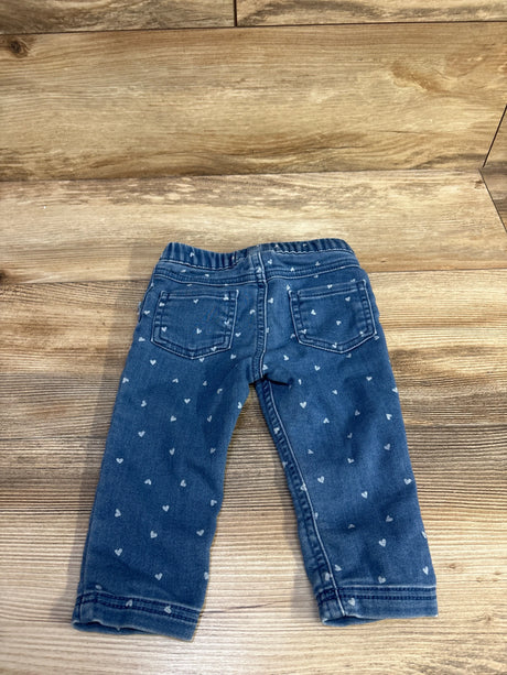 Front view of blue Cat & Jack toddler jeggings showing heart print and elastic waistband on white background