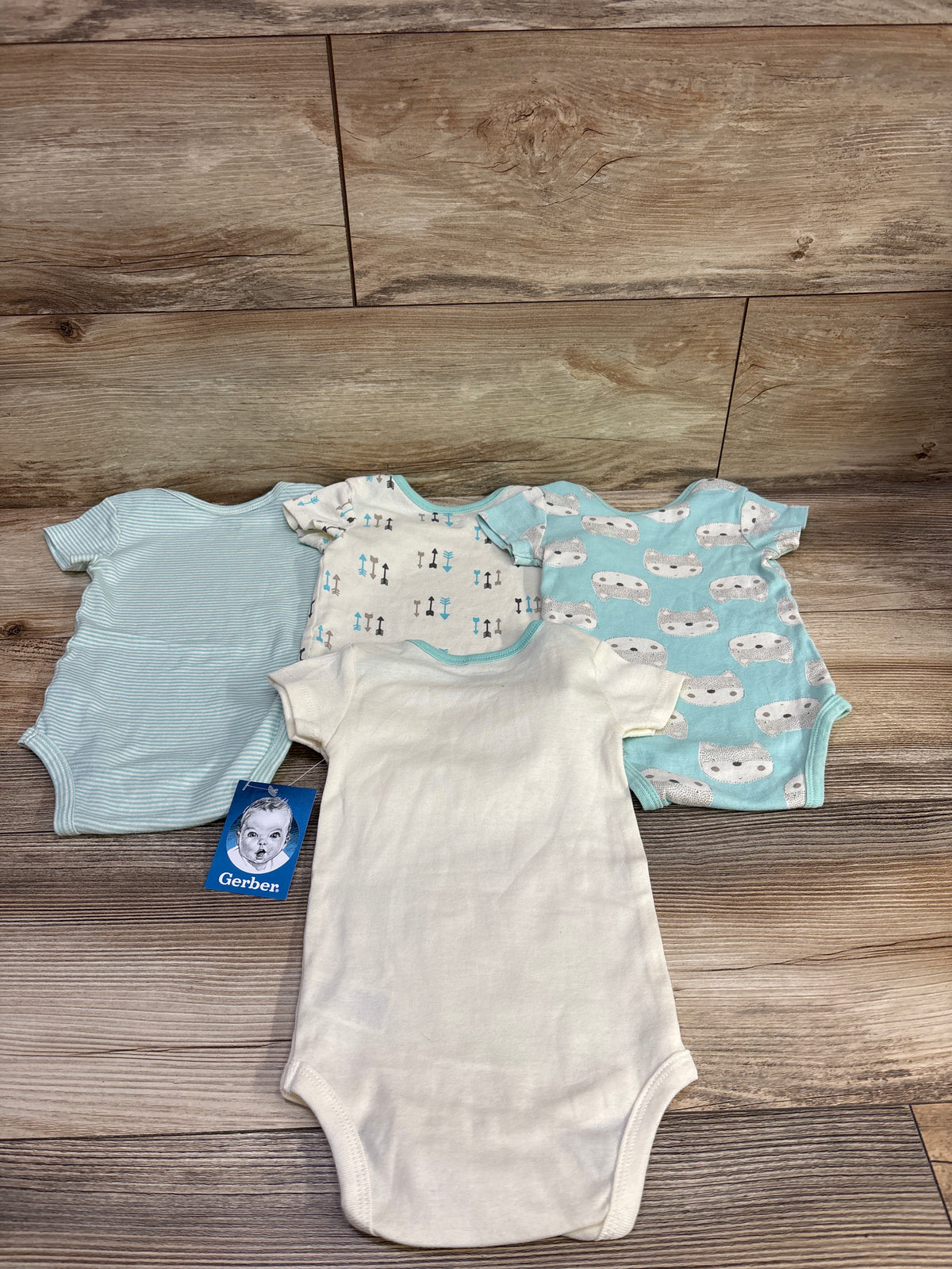 NEW Gerber 4pk Bodysuits Cream sz 6-9m