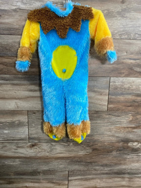 Front view of plush monster baby costume size 6–12 months showing blue fur, yellow belly, brown fuzzy collar and cuffs on wood floor