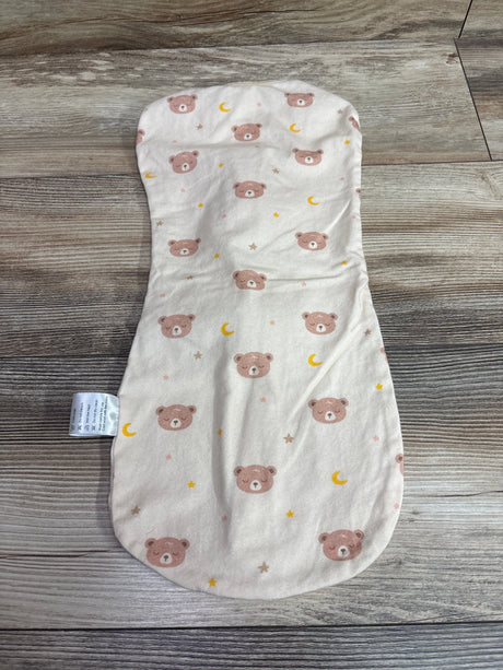 Flat lay of beige cotton arm-in zipper sleep sack showcasing bear, moon, and star pattern on wood grain