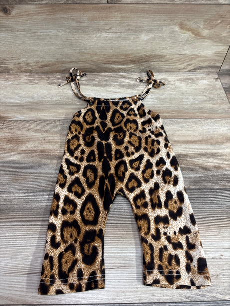 Shein tan leopard print baby jumpsuit for size 6-12m on a wooden background