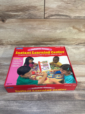 Front view of Lakeshore Instant Learning Center Syllable Count box showcasing children using syllable count mats on wood floor