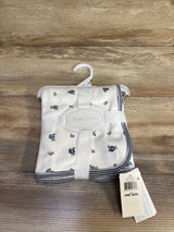 Front of folded Ralph Lauren baby blanket with Polo Bear print and navy striped trim on wood background, tag ONE SIZE