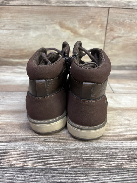 Rear view of brown Sonoma Goods for Life Joshua lace-up boots showcasing padded collars and contrast soles on a wood surface