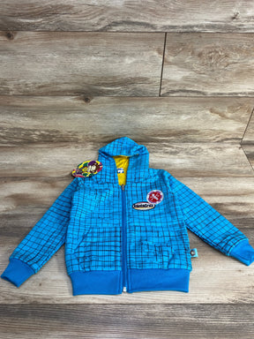 Blue children's zip-up hoodie with grid pattern, Santa Cruz patches, and yellow hood lining on wooden floor