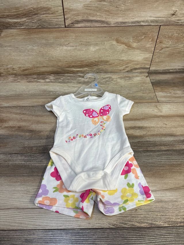 White baby onesie with pink butterfly and floral shorts, mini bean brand on hanger