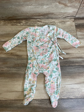 Flat lay of Rachel Zoe floral footed coverall, 6-9 months, showing side tie, long sleeves, and footed legs on wood floor
