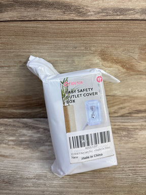Front view of Eudemon baby safety outlet cover box showing clear plastic outlet cover image on label with wooden background