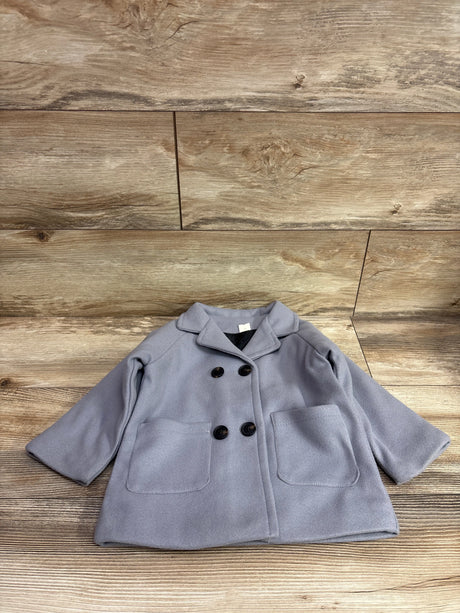 Front view of FAIWAD grey wool trench coat, size 2/3T, with double-breasted buttons and patch pockets on wood flooring