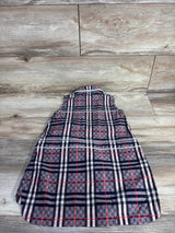 Flat lay of Burberry Carlotta sleeveless collared dress (4T) showing multicolor checkerboard pattern on light wood background