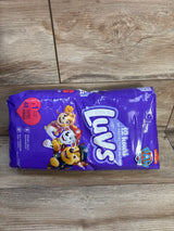 Top view of Luvs Paw Patrol diaper pack, size 1 (48 ct), purple packaging with Paw Patrol characters on wood floor