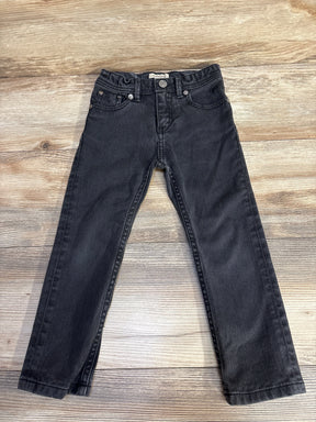 Flat lay of black Burberry toddler jeans (4T) showing straight legs, five-pocket styling and elastic waist on wood background
