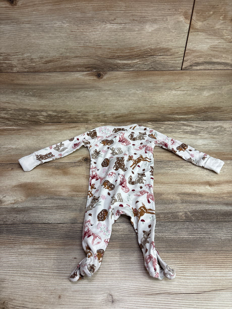 Top-down view of Member’s Mark ivory footed sleeper in size 3 months showcasing woodland animal print on a wood-look background