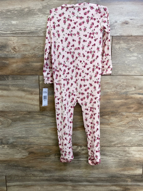 Back view of Betsey Johnson floral sleeper size 3T showing light pink rose print and attached footies on wood background