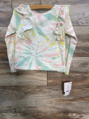 Toddler tie-dye long sleeve shirt with ruffle detail on shoulders, hanging on wooden hanger