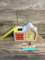 Wooden shape sorter toy house with colorful doors, slide, and keys for toddler learning and play