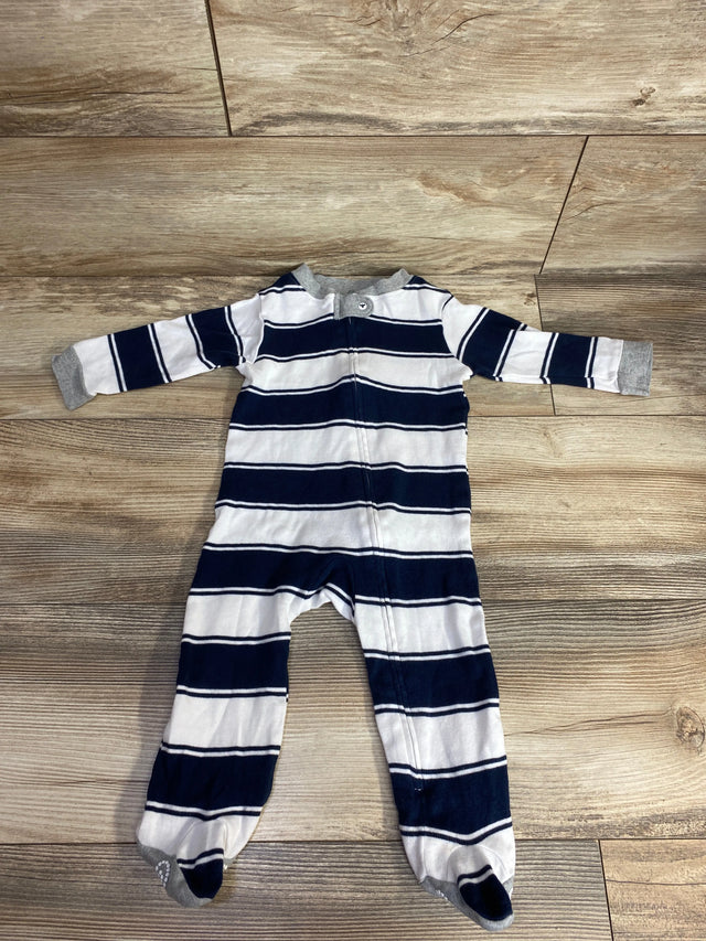 Navy and white striped footed baby onesie with gray cuffs and collar on wooden floor