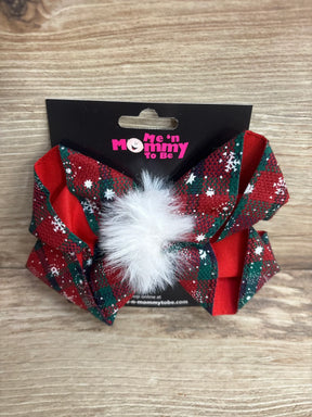 Festive red and green snowflake hair bow with white pom-pom for kids, holiday outfit accessory
