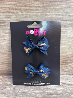 Navy blue reindeer print hair bows for kids, festive holiday accessory on black card