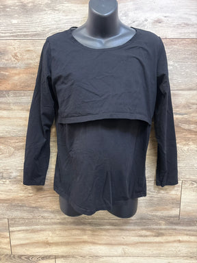 Front view of black Smallshow maternity nursing shirt showcasing two-layer nursing access with wood-look background