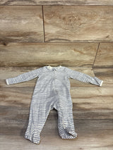 Front flat lay of Little Planet organic footed sleeper size 3M showing white fabric with thin navy stripes and front zipper on wood background