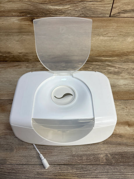 White baby bottle warmer with clear lid on wood surface, ideal for maternity and infant care essentials