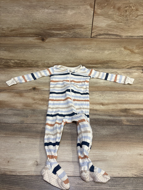 Front view of Member’s Mark ivory striped sleeper in size 12 months, with long sleeves, front zipper, and feet on wood flooring