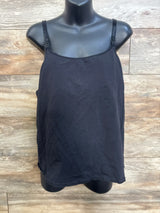 Front view of black a glow maternity nursing tank top on mannequin showcasing adjustable nursing straps with wood background