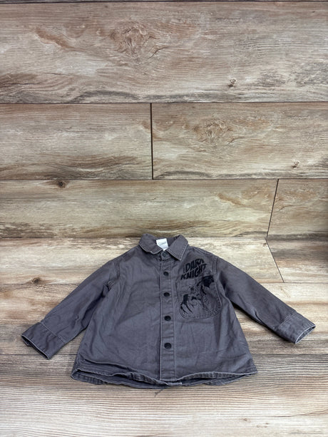 Grey DC Batman Dark Knight button-up shirt for toddlers, size 2T, on a wood background.