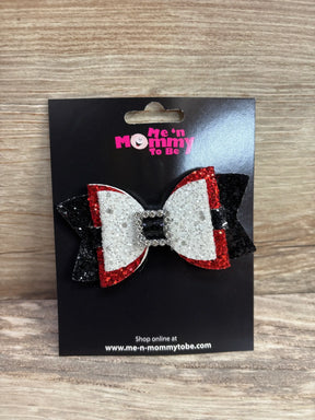 Sparkly red, white, and black kids hair bow with rhinestone center on retail card