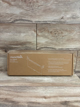 Front view of Munchkin Sun Safety Car Window Roller Shades 2pk box showing UVA and UVB blocking on wood-patterned background