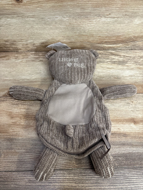 Top view of Little Bug Bev bear lovie showing brown corduroy, embroidered Little Bug on head and ribbed tummy on wood