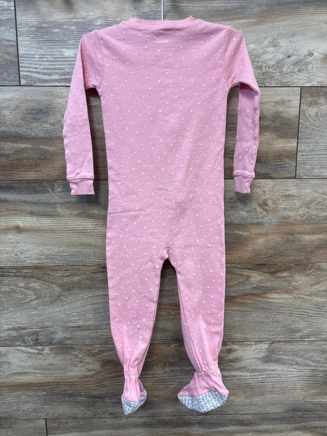 Back view of Carter’s unicorn sleeper in pink, size 3T, showcasing a white star pattern and footed legs on a wood floor