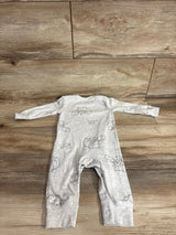 Flat lay of gray Carter's 6-month baby coverall showing elephant outline print and snap leg closures on wood floor background