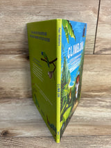 Children's book titled 'Climb On!' with jungle animals and a child on the cover, placed on wood background