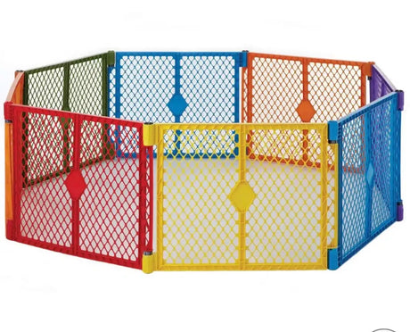 Three-quarter view of Toddleroo by North States Superyard Colorplay eight panel freestanding gate with colorful mesh panels