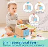 Three-quarter view of wooden Montessori toy box with open blue drawer, carrot pegs, and matchstick color-drop board with baby sitting on floor behind