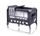 Portable baby playpen with penguin print, mesh sides, canopy, and wheels for easy mobility