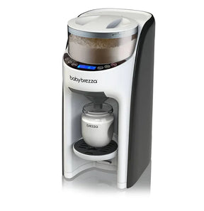 Baby Brezza formula dispenser with digital controls and milk bottle under the nozzle