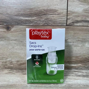 Front view of Playtex Baby Drop Ins 100 count box showing 4 oz presterilized liners and packaging on a wood backdrop