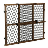 Expandable wooden and black metal baby safety gate with diamond pattern mesh for childproofing