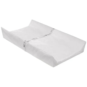 White contoured baby changing pad with safety strap for nursery diaper changes
