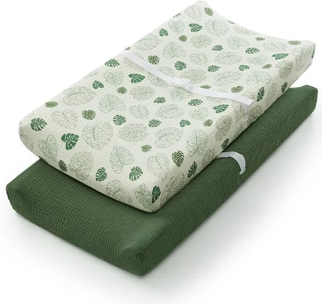 Green and white baby changing pad covers with leaf pattern, nursery essentials