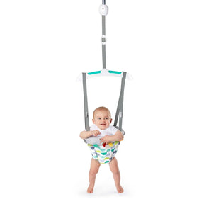 Front view of Bright Starts Playful Parade door jumper showing patterned seat, adjustable gray straps, door-mount hardware on white background