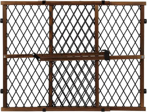 Front view of Evenflo Position & Lock gate with wood-look frame, diamond mesh panels and center latch on white background